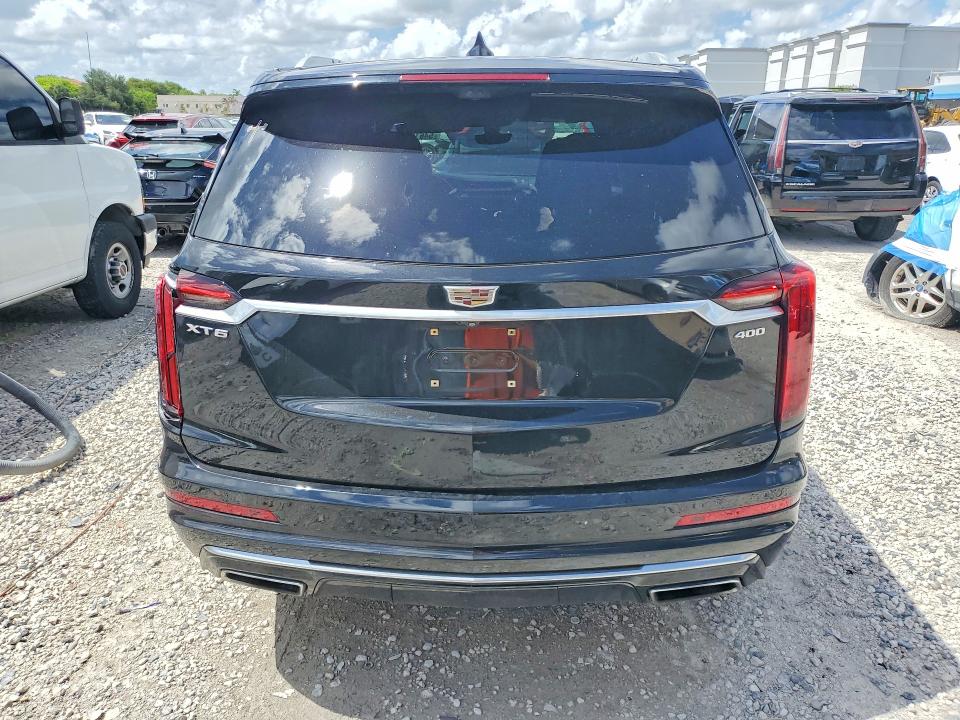 2021 Cadillac Xt6 VIN 1GYKPCRS0MZ206618 COPART salvage auction — SIDE, Fl - Cert Of Title Slvg Rebuildable, sold $8,600 on 2026-08-21 (photo 6)