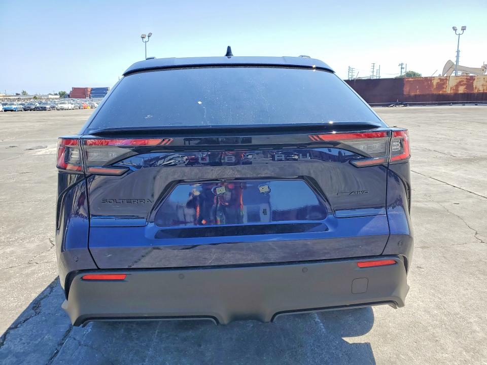 2026 Subaru Solterra VIN JTMBEAGC8TJ001122 COPART salvage auction — FRONT END, Salvage Title, sold $9,900 on 2026-07-15 (photo 6)