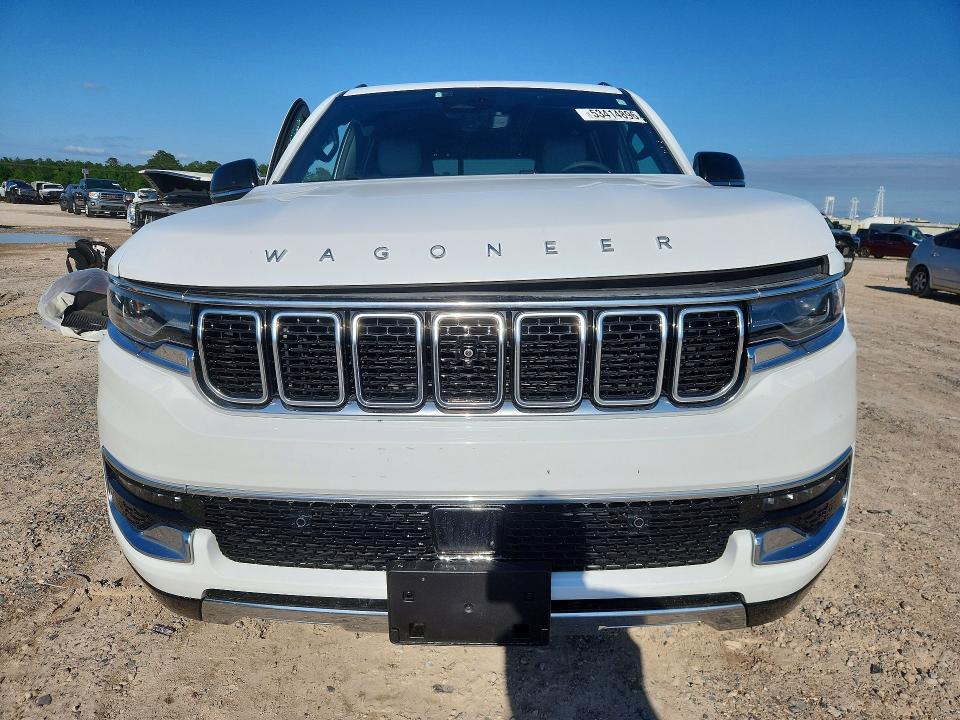 2025 Jeep Grand wagoneer VIN 1C4SJSDP9SS504613 COPART salvage auction — SIDE, Tx - Salvage Vehicle Title, sold $24,100 on 2026-07-24 (photo 5)