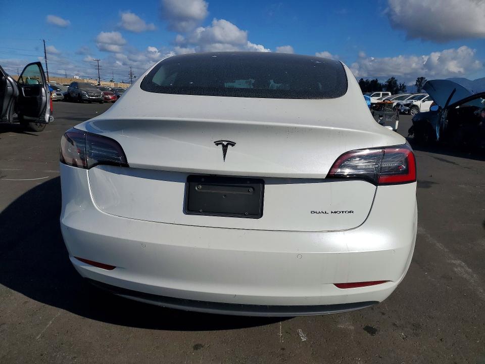 2022 Tesla Model 3 VIN 5YJ3E1EB8NF137548 COPART salvage auction — MINOR DENT/SCRATCHES, Ca - Salvage Certificate, sold $14,400 on 2026-07-06 (photo 6)