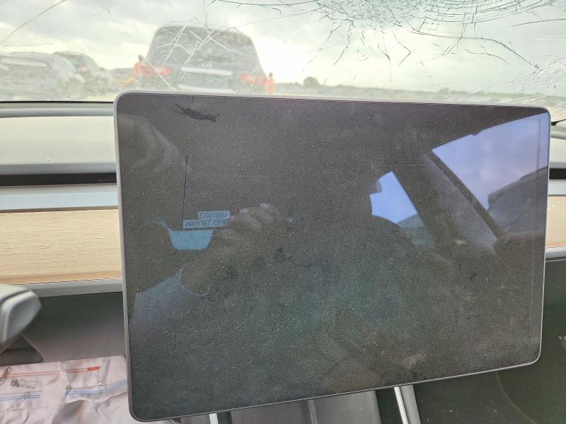 2018 Tesla Model 3 VIN 5YJ3E1EB7JF127412 COPART salvage auction — FRONT END, Tx - Certificate Of Title, sold $2,550 on 2026-07-02 (photo 9)