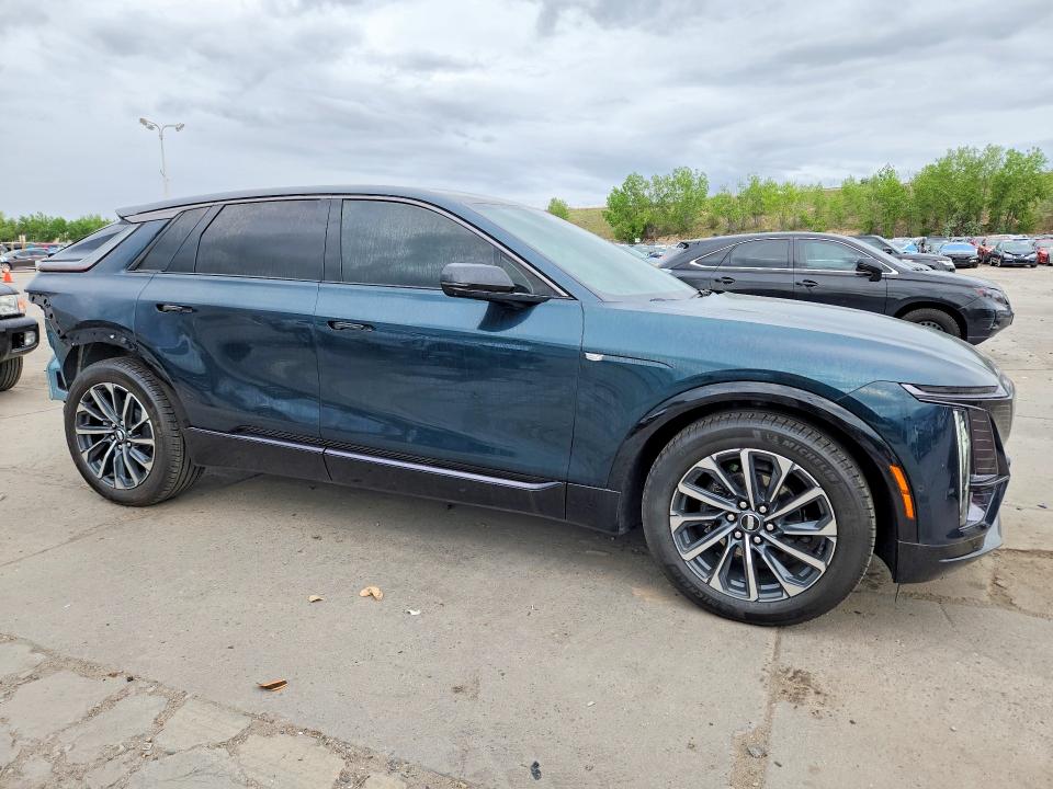 2024 Cadillac Lyriq VIN 1GYKPVRL7RZ142475 COPART salvage auction — REAR END, Co - Salvage Title, sold $1,300 on 2026-07-27 (photo 4)