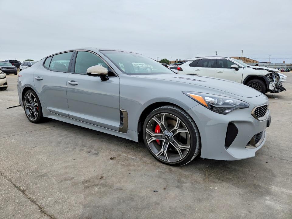 2020 Kia Stinger VIN KNAE45LC1L6080209 COPART salvage auction — SIDE, Tx - Certificate Of Title, sold $5,700 on 2026-07-23 (photo 4)