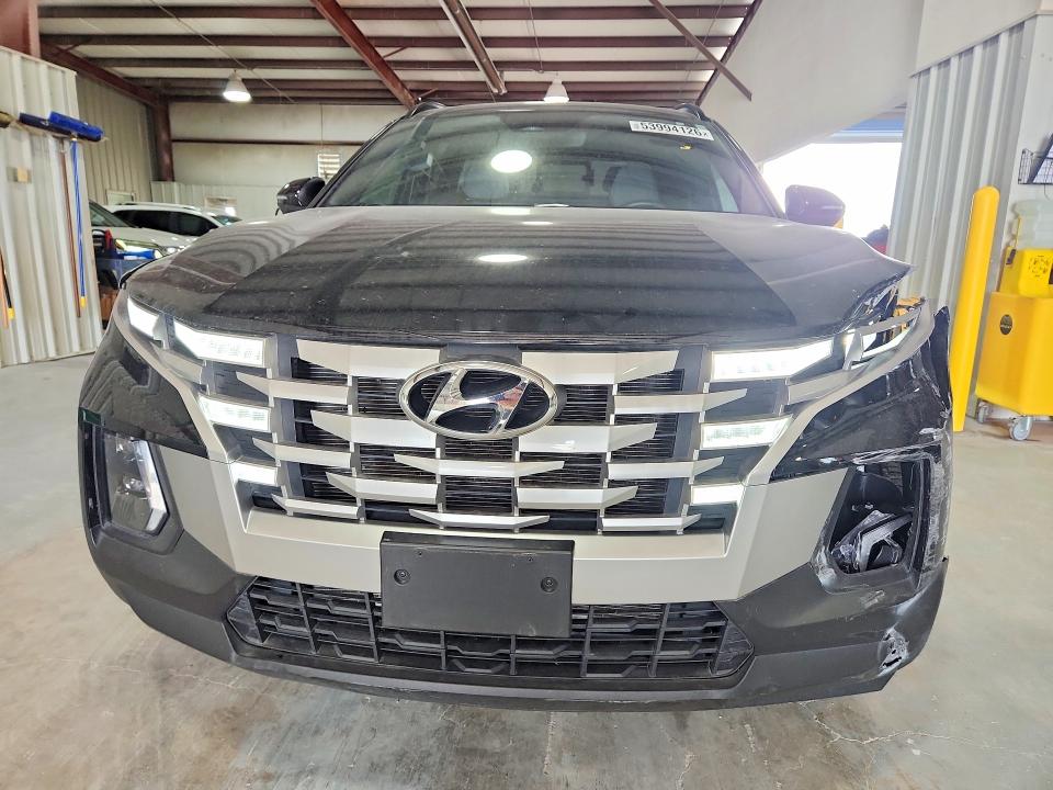2024 Hyundai Santa cruz VIN 5NTJC4DEXRH111522 COPART salvage auction — FRONT END, Tx - Salvage Vehicle Title, sold $8,500 on 2026-07-21 (photo 5)