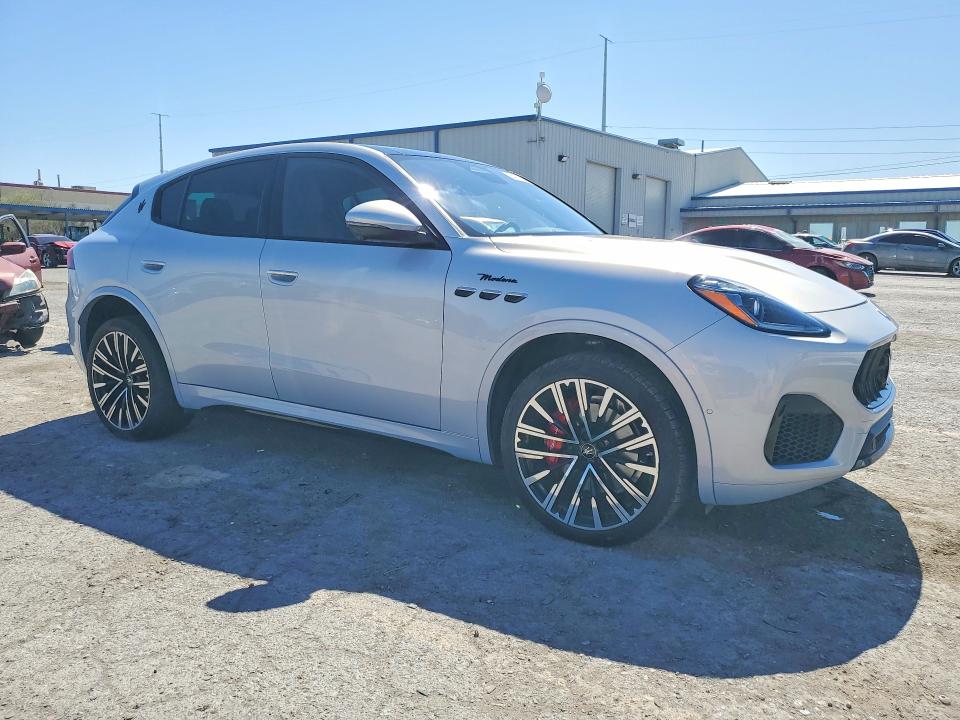 2023 Maserati Grecale VIN ZN682AVM4P7407902 COPART salvage auction — SIDE, Nv - Salvage Title, sold $275 on 2026-07-02 (photo 4)