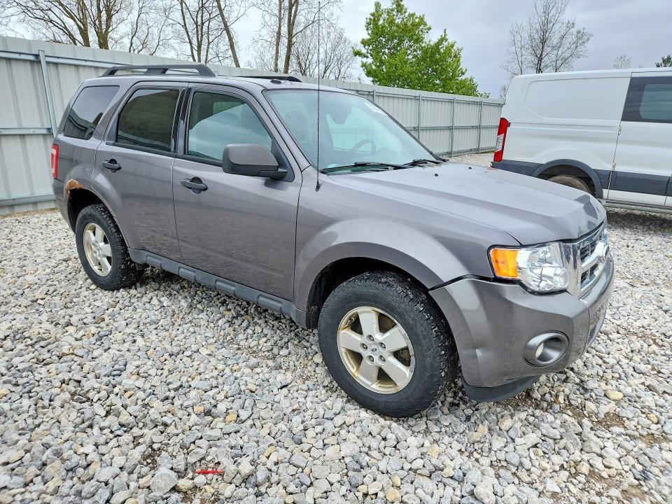 2011 Ford Escape VIN 1FMCU9DG6BKA21385 COPART salvage auction — WATER/FLOOD, MI - CERT OF TITLE-FLOOD VEHICLE, sold $200 on 2026-07-02 (photo 4)