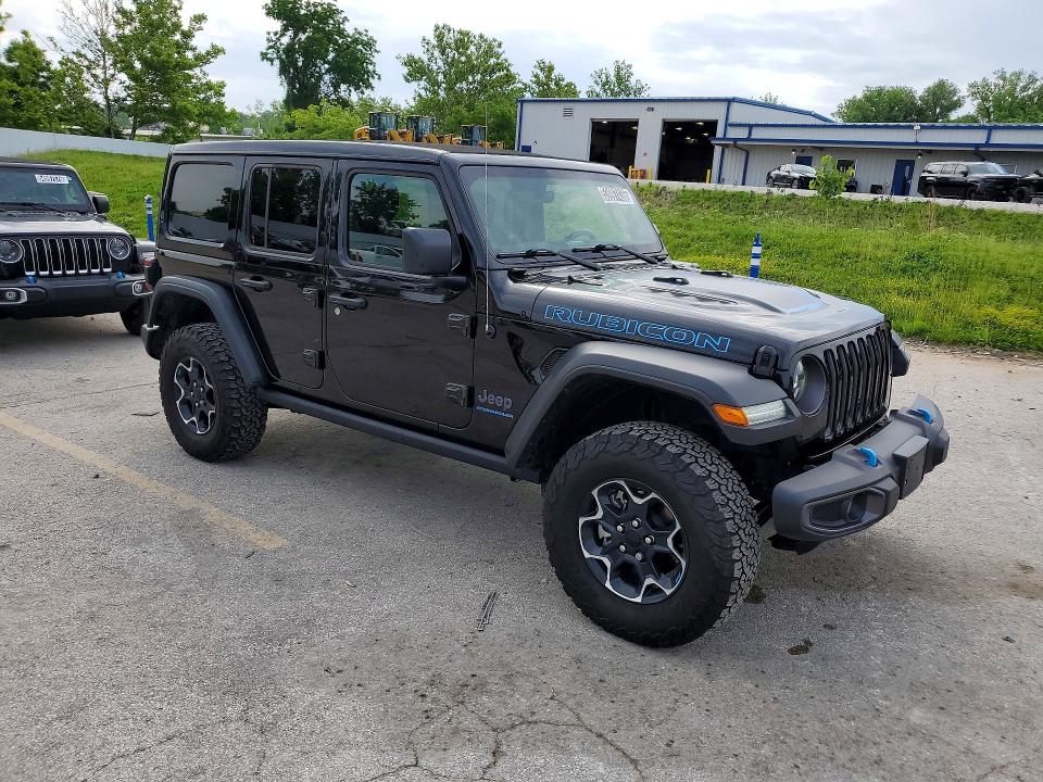 2023 Jeep Wrangler / VIN 1C4JJXR67PW518535 COPART salvage auction — MINOR DENT/SCRATCHES, Mo - Certificate Of Title, sold $24,250 on 2026-07-02 (photo 4)