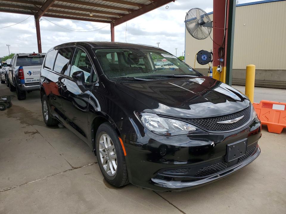 2023 Chrysler Voyager VIN 2C4RC1CG2PR511545 COPART salvage auction — MINOR DENT/SCRATCHES, Tx - Nonrepairable Title, sold $2,250 on 2026-09-17 (photo 4)