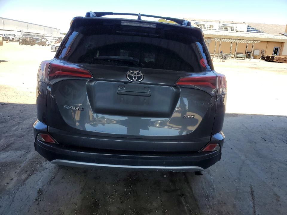 2016 Toyota Rav4 VIN JTMWFREV9GJ084180 COPART salvage auction — ALL OVER, Ca - Salvage Certificate, sold $2,450 on 2026-07-02 (photo 6)