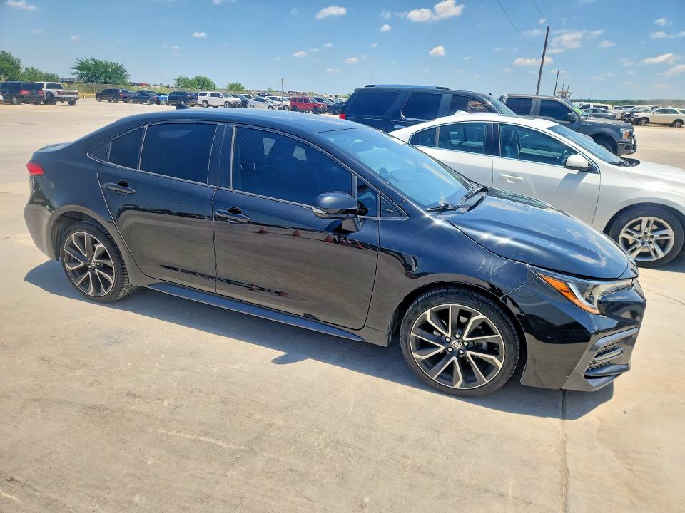 2020 Toyota Corolla VIN JTDS4RCE9LJ023736 COPART salvage auction — HAIL, Tx - Certificate Of Title, sold $7,200 on 2026-07-23 (photo 4)