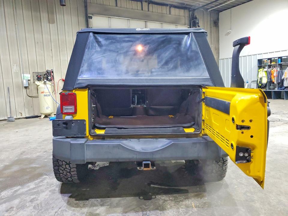 2009 Jeep Wrangler / VIN 1J4FA24129L741679 COPART salvage auction — SIDE, NH - CERT OF TITLE-SALVAGE, sold $925 on 2026-07-02 (photo 6)