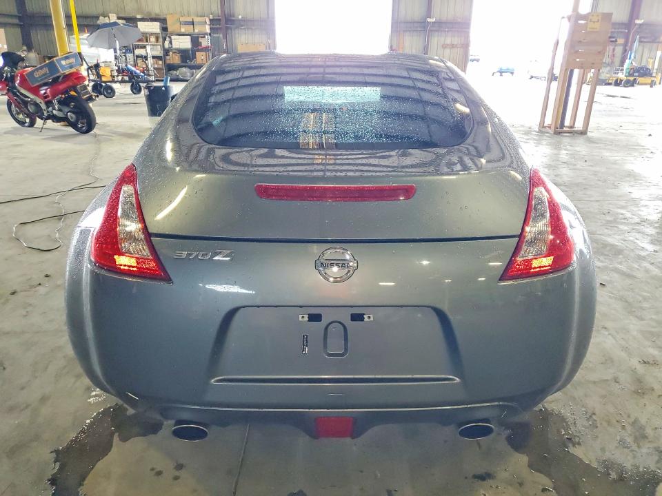 2015 Nissan VIN JN1AZ4EH7FM443976 COPART salvage auction — SIDE, Fl - Cert Of Title Slvg Rebuildable, sold $15 on 2026-07-29 (photo 6)