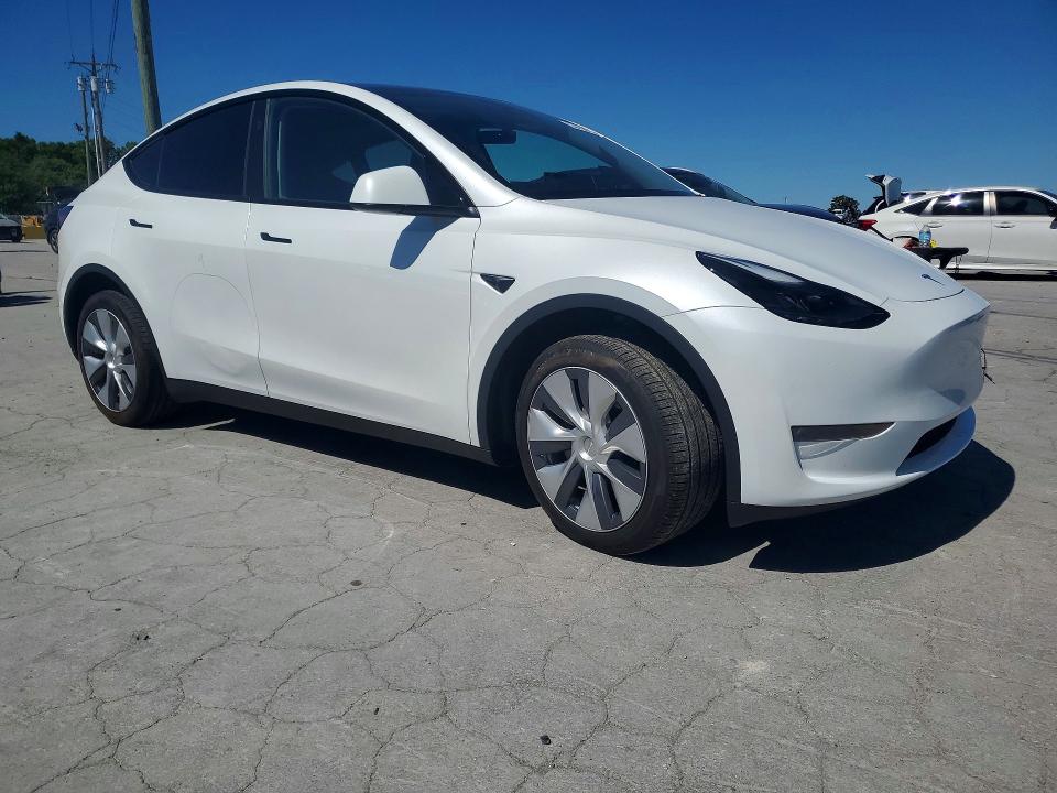 2024 Tesla VIN 7SAYGDEE5RA281155 COPART salvage auction — SIDE, TN - SALVAGE CERTIFICATE, sold $14,000 on 2026-07-20 (photo 4)