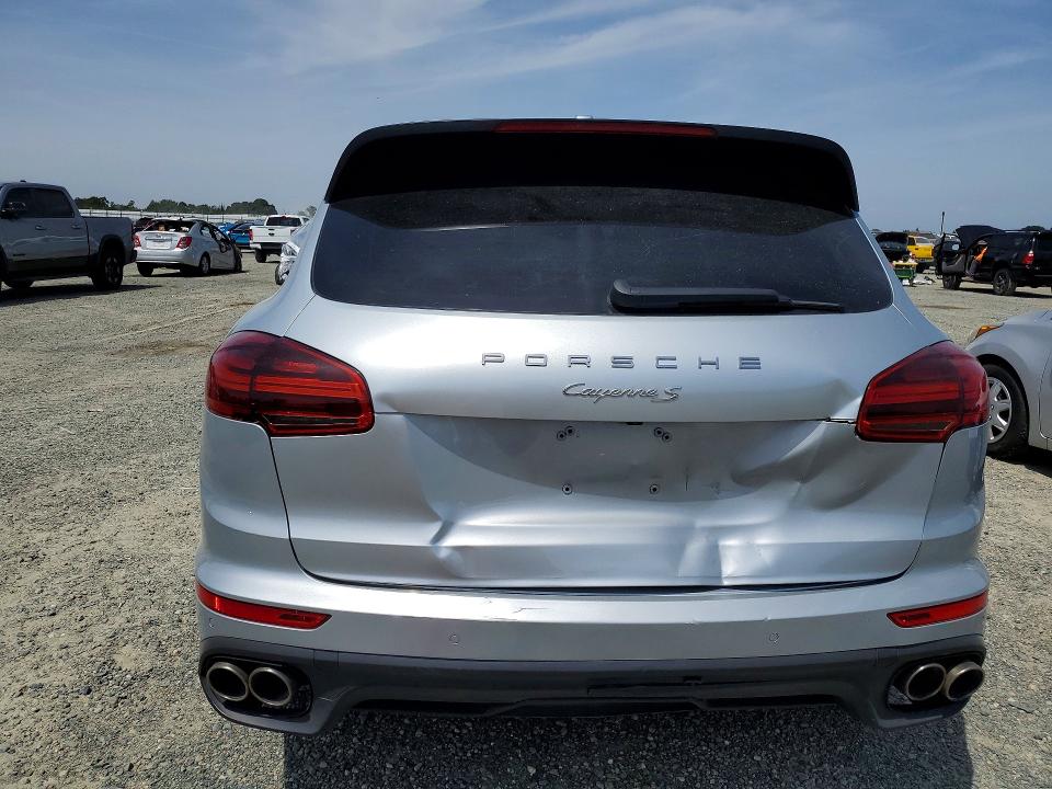 2015 Porsche Cayenne VIN WP1AB2A22FLA60118 COPART salvage auction — MINOR DENT/SCRATCHES, Fl - Dis/Dlr/Exp Only Clean Title, sold $4,450 on 2026-07-30 (photo 6)
