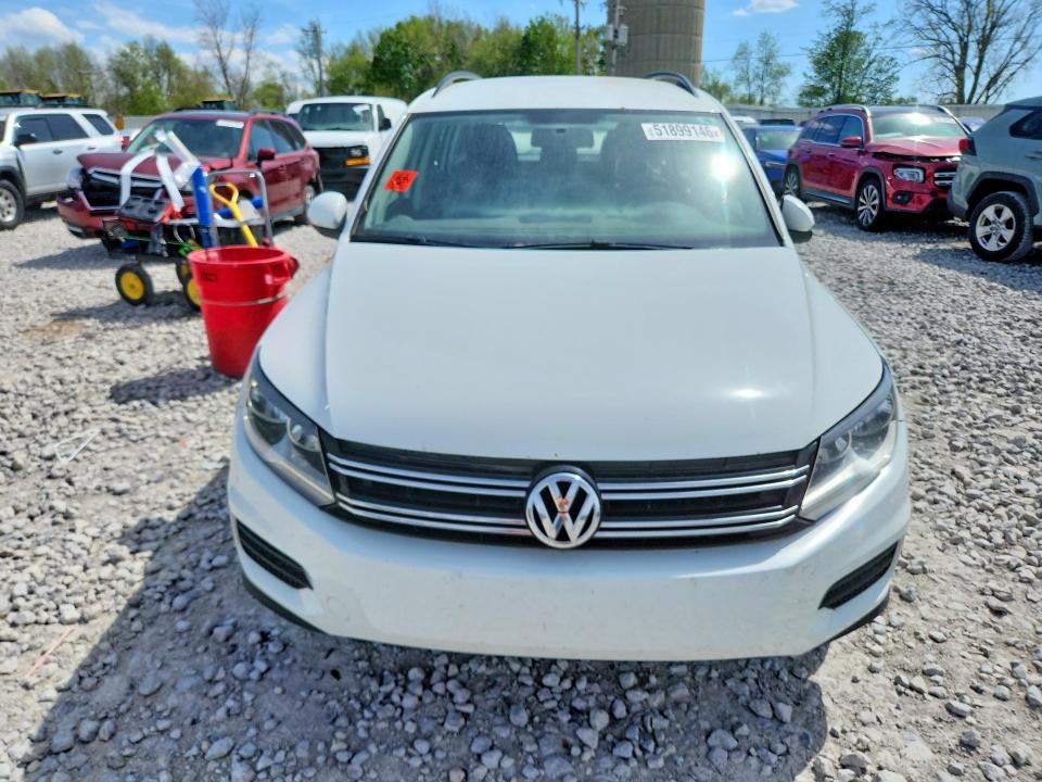 2015 Volkswagen Tiguan VIN WVGBV7AX0FW512888 COPART salvage auction — NORMAL WEAR, Mi - Dealer Only Clean Title, sold $600 on 2026-07-16 (photo 5)