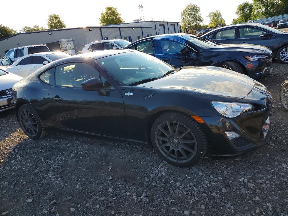 2015 Scion VIN JF1ZNAA16F9706146 COPART salvage auction — REAR END, Id - Salvage Certificate Of Title, sold $2,000 on 2026-07-06 (photo 4)