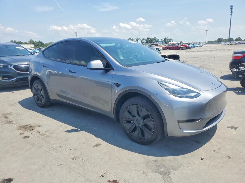 2024 Tesla Model y VIN 7SAYGDEEXRA320838 COPART salvage auction — MINOR DENT/SCRATCHES, Tx - Certificate Of Title (P), sold $20,600 on 2026-07-13 (photo 4)