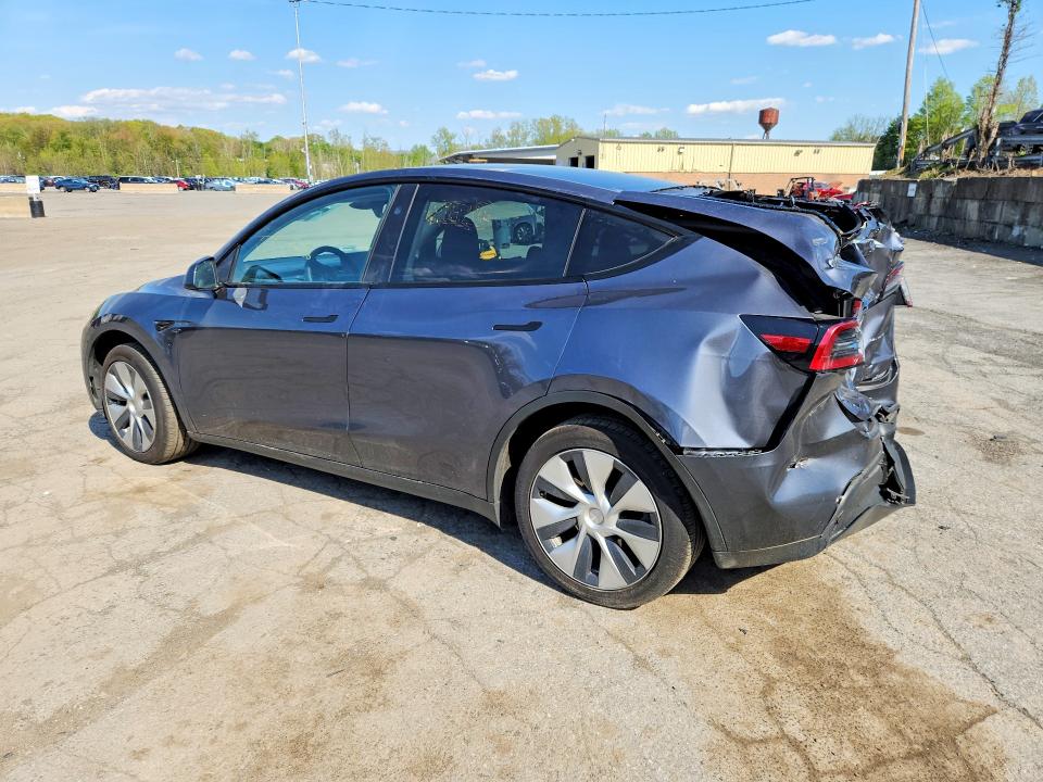 2023 Tesla Model y VIN 7SAYGDEEXPF884005 COPART salvage auction — REAR END, Ct - Cert Of Title-Salvage, sold $8,200 on 2026-07-30 (photo 2)