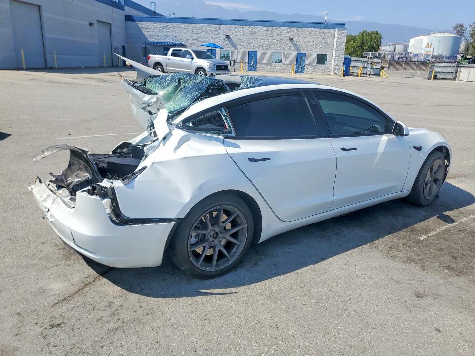 2023 Tesla Model 3 VIN 5YJ3E1EA0PF665515 COPART salvage auction — ALL OVER, CA - SALVAGE CERTIFICATE, sold $4,150 on 2026-07-16 (photo 3)