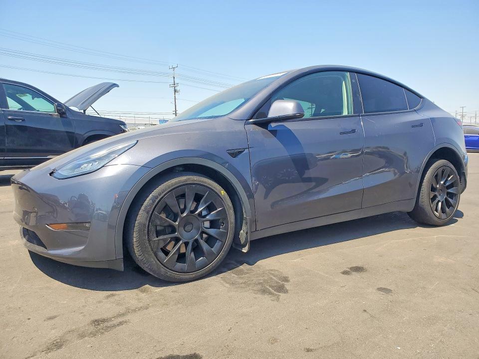 2022 Tesla Model y VIN 7SAYGAEEXNF400989 COPART salvage auction — FRONT END, Ca - Salvage Certificate, sold $9,600 on 2026-07-13 (photo 1)