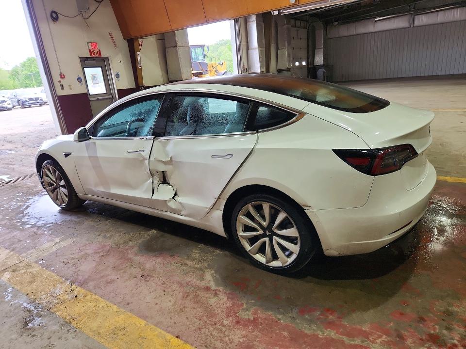 2018 Tesla Model 3 VIN 5YJ3E1EA1JF126506 COPART salvage auction — SIDE, Wv - Certificate Of Title, sold $6,500 on 2026-07-23 (photo 2)