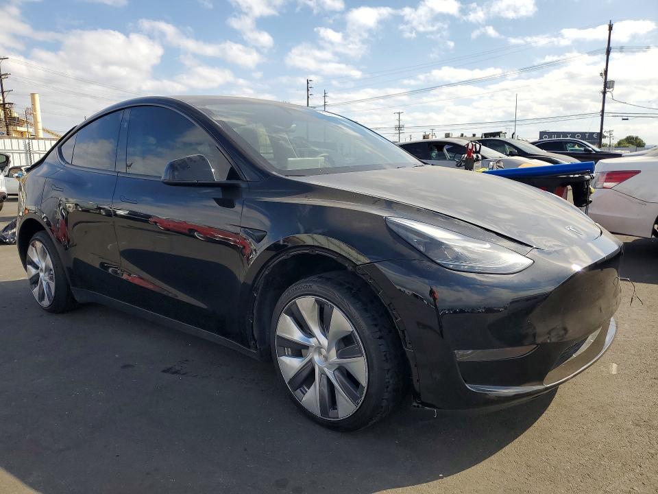 2023 Tesla Model y VIN 7SAYGDEE6PA208714 COPART salvage auction — REAR END, Ca - Salvage Certificate, sold $11,700 on 2026-07-20 (photo 4)