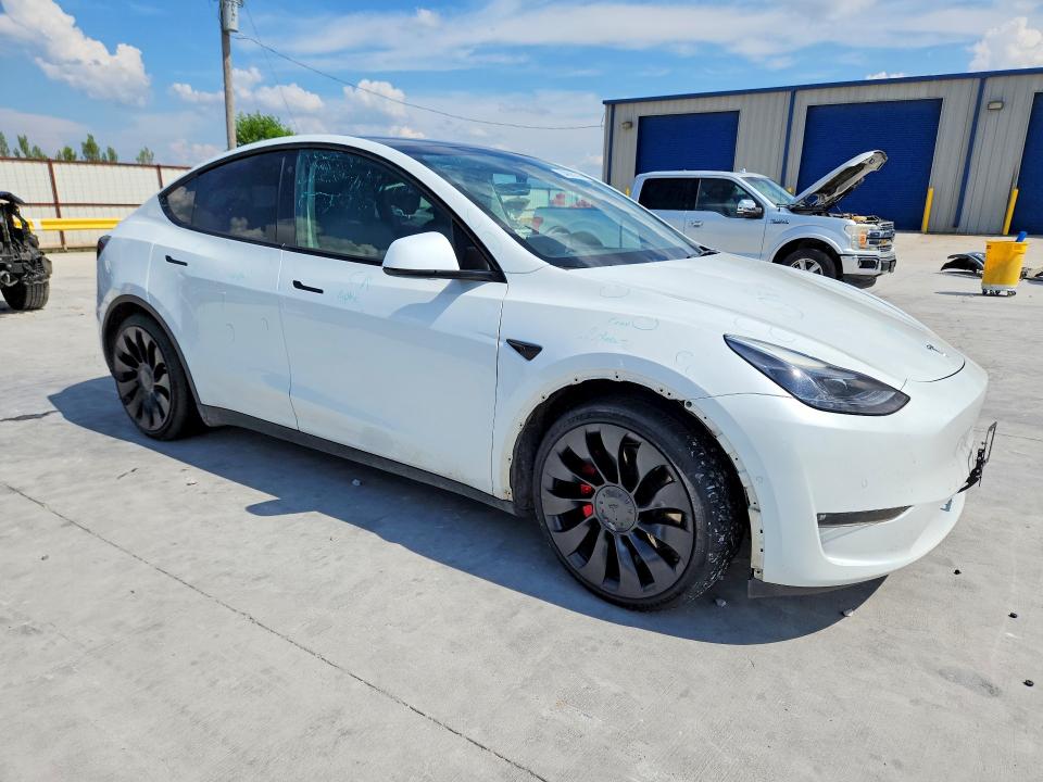 2022 Tesla Model y VIN 7SAYGDEF4NF534729 COPART salvage auction — HAIL, Tx - Certificate Of Title, sold $9,100 on 2026-08-28 (photo 4)