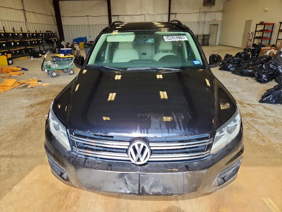 2017 Volkswagen Tiguan VIN WVGAV7AXXHK016745 COPART salvage auction — MINOR DENT/SCRATCHES, Tx - Certificate Of Title, sold $600 on 2026-07-07 (photo 5)