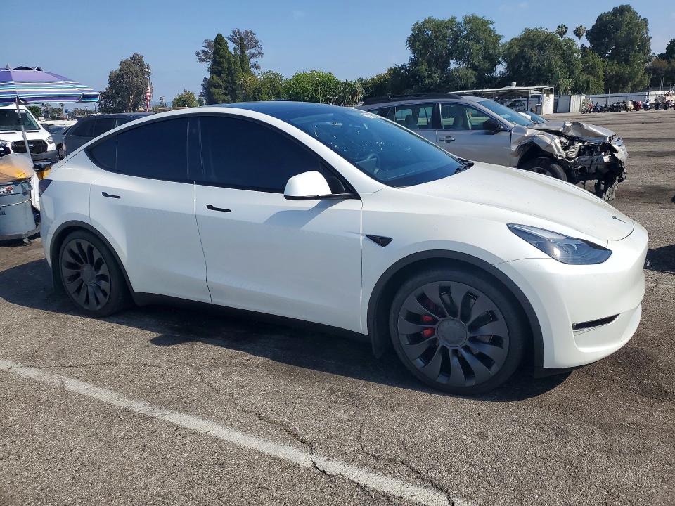 2023 Tesla Model y VIN 7SAYGDEF4PF762717 COPART salvage auction — SIDE, Ca - Salvage Certificate, sold $13,000 on 2026-07-31 (photo 4)