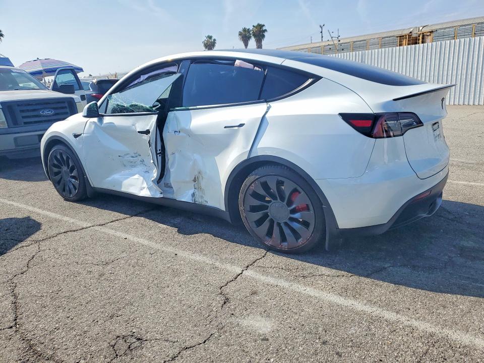 2023 Tesla Model y VIN 7SAYGDEF4PF762717 COPART salvage auction — SIDE, Ca - Salvage Certificate, sold $13,000 on 2026-07-31 (photo 2)