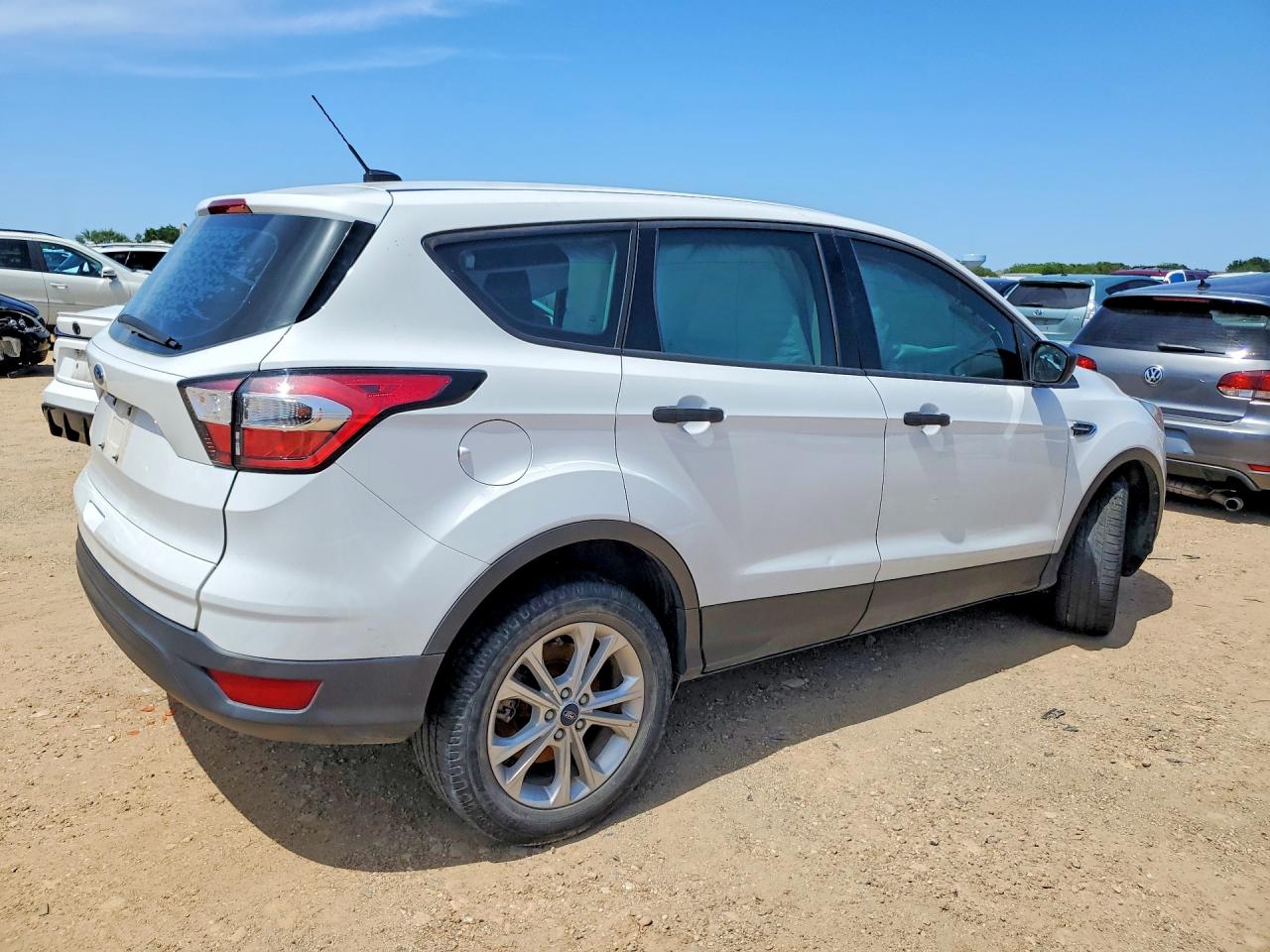 2017 Ford Escape VIN 1FMCU0F70HUD10316 COPART salvage auction — Side, TX - SALVAGE VEHICLE TITLE, sold $1,150 on 2026-07-09 (photo 3)