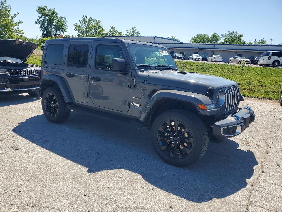 2023 Jeep Wrangler / VIN 1C4JJXP65PW515300 COPART salvage auction — NORMAL WEAR, Mo - Certificate Of Title, sold $18,400 on 2026-07-02 (photo 4)