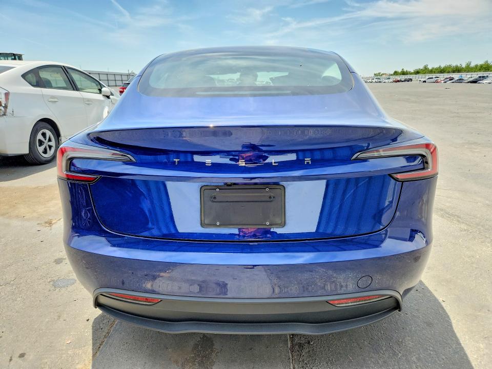 2025 Tesla Model 3 VIN 5YJ3E1EA4SF057005 COPART salvage auction — SIDE, Ca - Salvage Certificate, sold $11,300 on 2026-07-13 (photo 6)