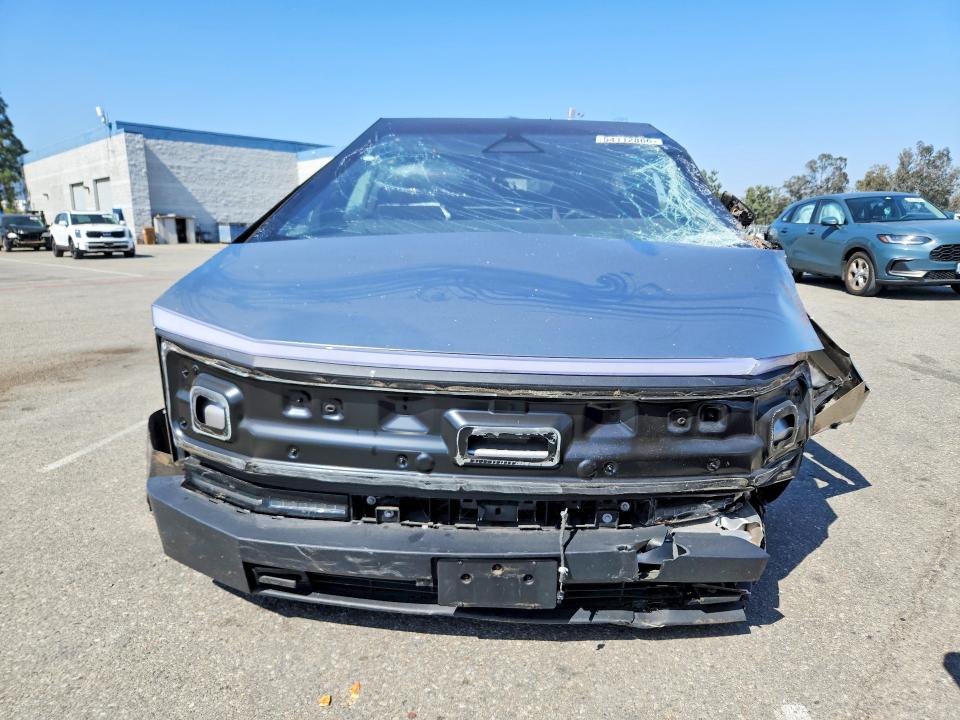 2025 Tesla Cybertruck VIN 7G2CEHED9SA067915 COPART salvage auction — ALL OVER, Ca - Salvage Certificate, sold $14,500 on 2026-07-28 (photo 5)