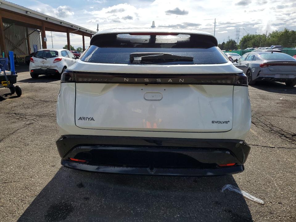 2024 Nissan Ariya VIN JN1BF0BA1RM432070 COPART salvage auction — SIDE, Co - Salvage Title, sold $325 on 2026-07-28 (photo 6)