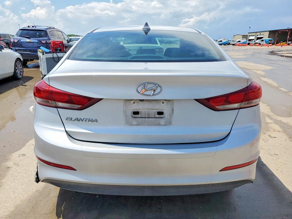 2018 Hyundai Elantra VIN KMHD84LF4JU586161 COPART salvage auction — SIDE, Tx - Salvage Vehicle Title, sold $4,750 on 2026-07-23 (photo 6)