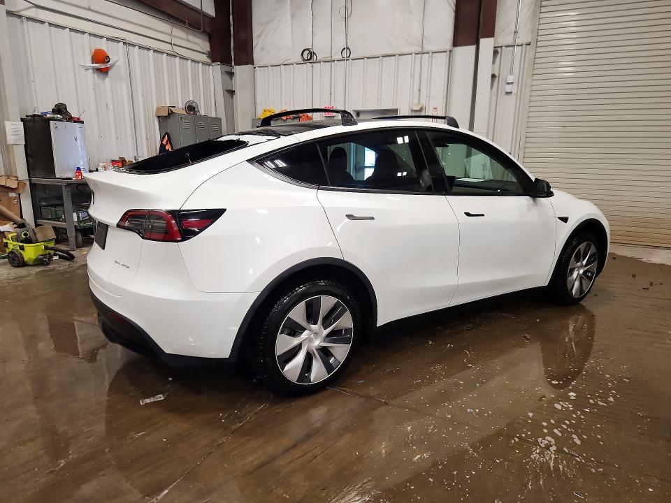 2023 Tesla VIN 7SAYGDEE9PF714007 COPART salvage auction — HAIL, Salvage Title, sold $12,000 on 2026-07-20 (photo 3)