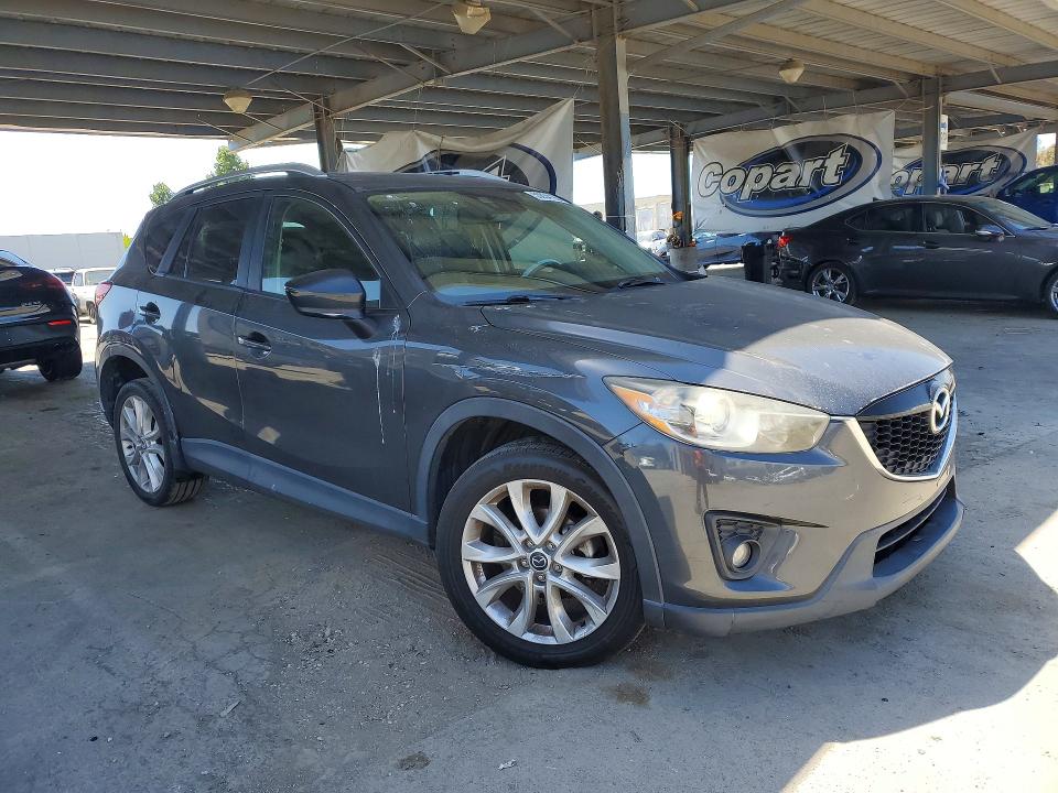 2014 Mazda Cx-5 VIN JM3KE4DY5E0384664 COPART salvage auction — VANDALISM, Ca - Salvage Certificate, sold $3,300 on 2026-07-09 (photo 4)