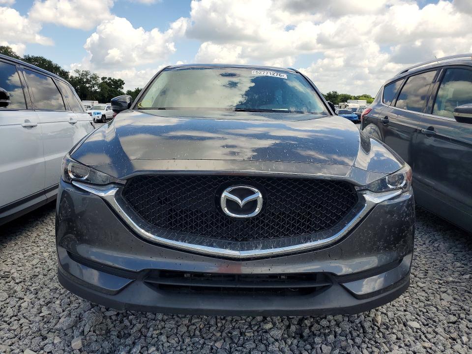 2017 Mazda Cx-5 VIN JM3KFACL6H0222838 COPART salvage auction — SIDE, Fl - Cert Of Title Slvg Rebuildable, sold $4,000 on 2026-07-07 (photo 5)