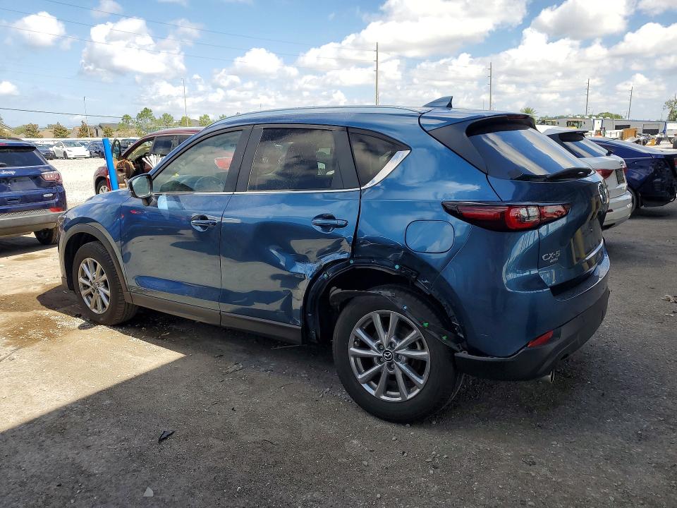 2022 Mazda Cx-5 VIN JM3KFBCM7N1559006 COPART salvage auction — SIDE, Fl - Cert Of Title Slvg Rebuildable, sold $10,000 on 2026-07-10 (photo 2)