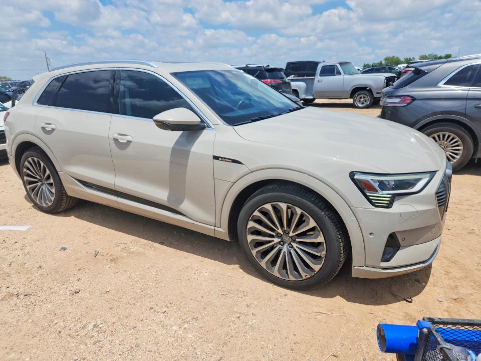 2019 Audi E-tron VIN WA1VABGE5KB022870 COPART salvage auction — SIDE, TX - SALVAGE VEHICLE TITLE, sold $11,900 on 2026-07-16 (photo 4)