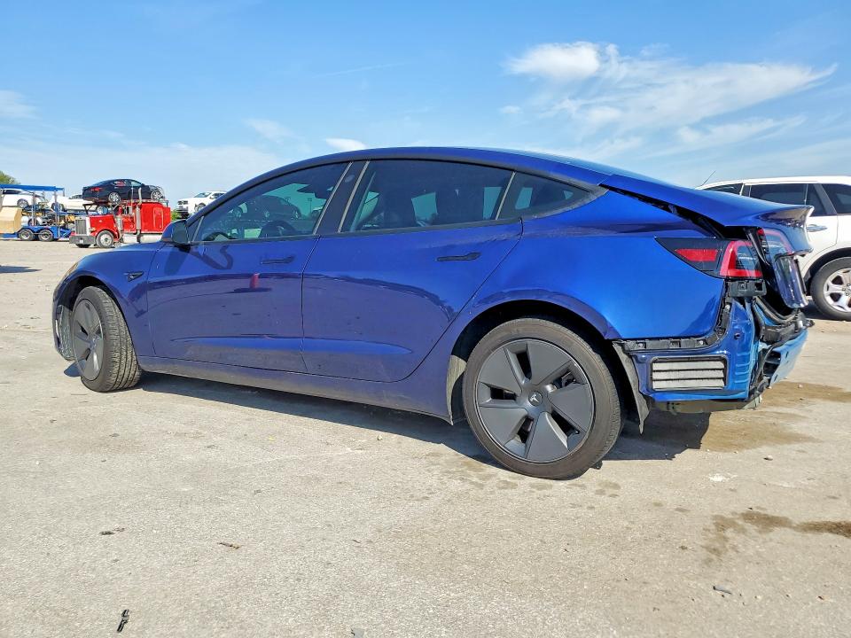 2023 Tesla Model 3 VIN 5YJ3E1EA9PF490794 COPART salvage auction — REAR END, Salvage Title, sold $7,400 on 2026-09-01 (photo 2)