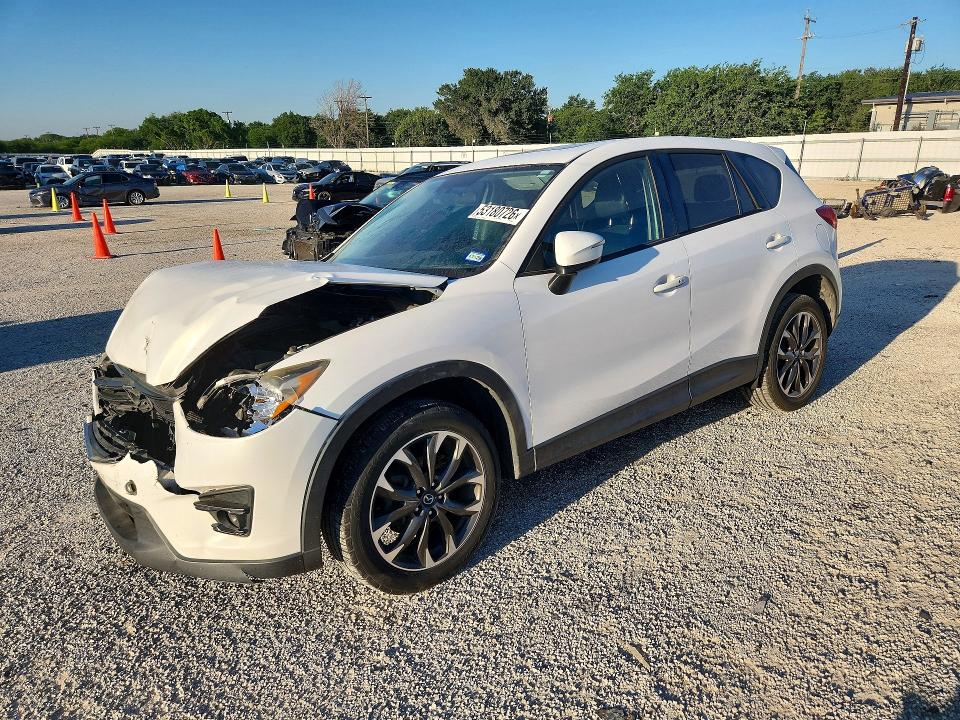 2016 Mazda Cx-5 VIN JM3KE4DY7G0773048 — COPART salvage auction photo