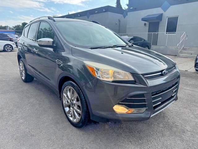 2016 Ford Escape VIN 1FMCU0GX4GUC35892 COPART salvage auction — MINOR DENT/SCRATCHES, Fl - Certificate Of Destruction (P), sold $3,900 on 2026-07-09 (photo 4)