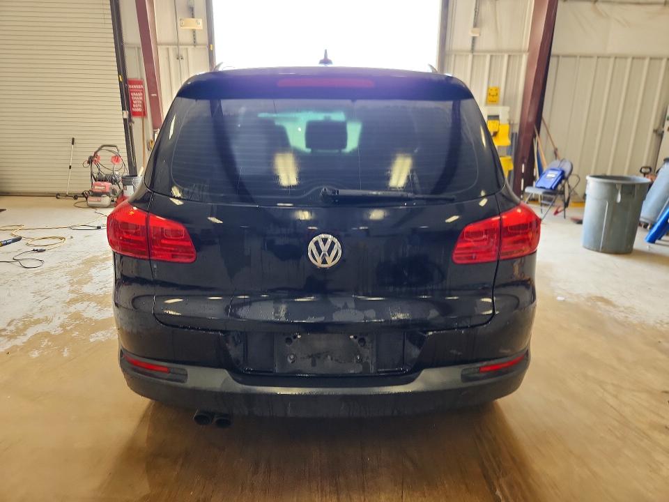 2017 Volkswagen Tiguan VIN WVGAV7AXXHK016745 COPART salvage auction — MINOR DENT/SCRATCHES, Tx - Certificate Of Title, sold $600 on 2026-07-07 (photo 6)