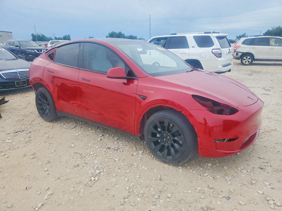 2023 Tesla Model y VIN 7SAYGDEE9PA099620 COPART salvage auction — REAR END, Tx - Salvage Vehicle Title, sold $6,400 on 2026-07-16 (photo 4)