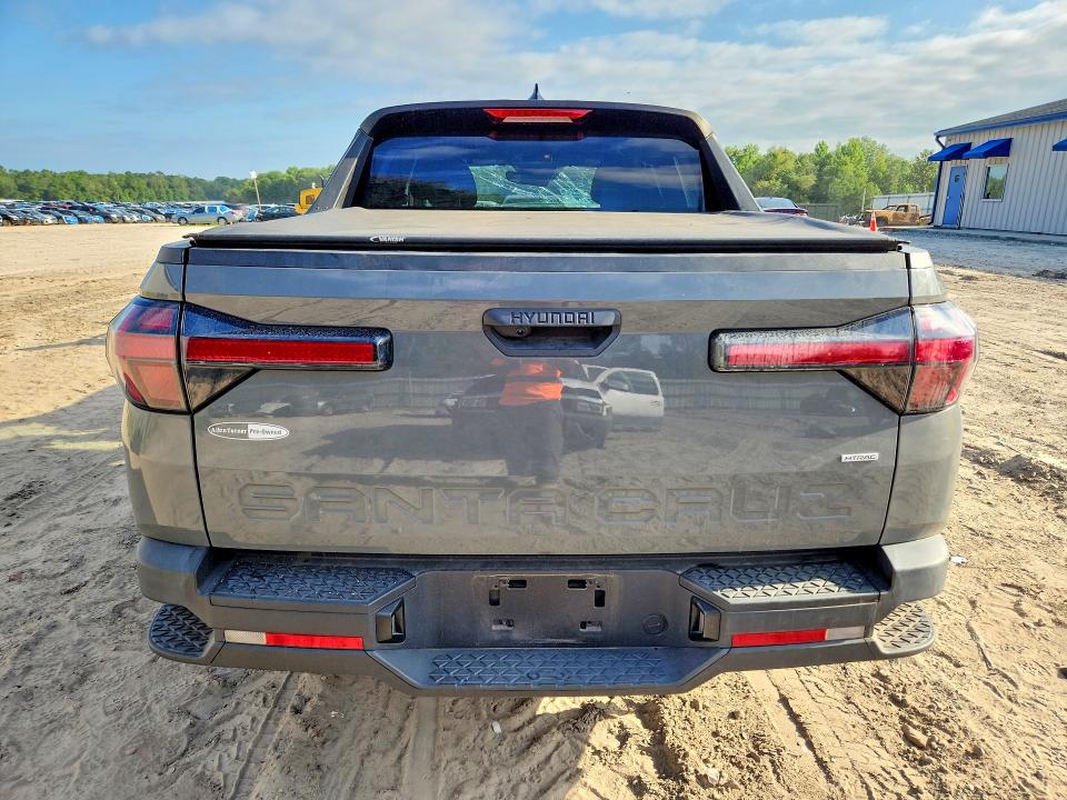 2023 Hyundai Santa cruz VIN 5NTJBDAE7PH042552 COPART salvage auction — FRONT END, Fl - Certificate Of Destruction, sold $4,000 on 2026-07-31 (photo 6)
