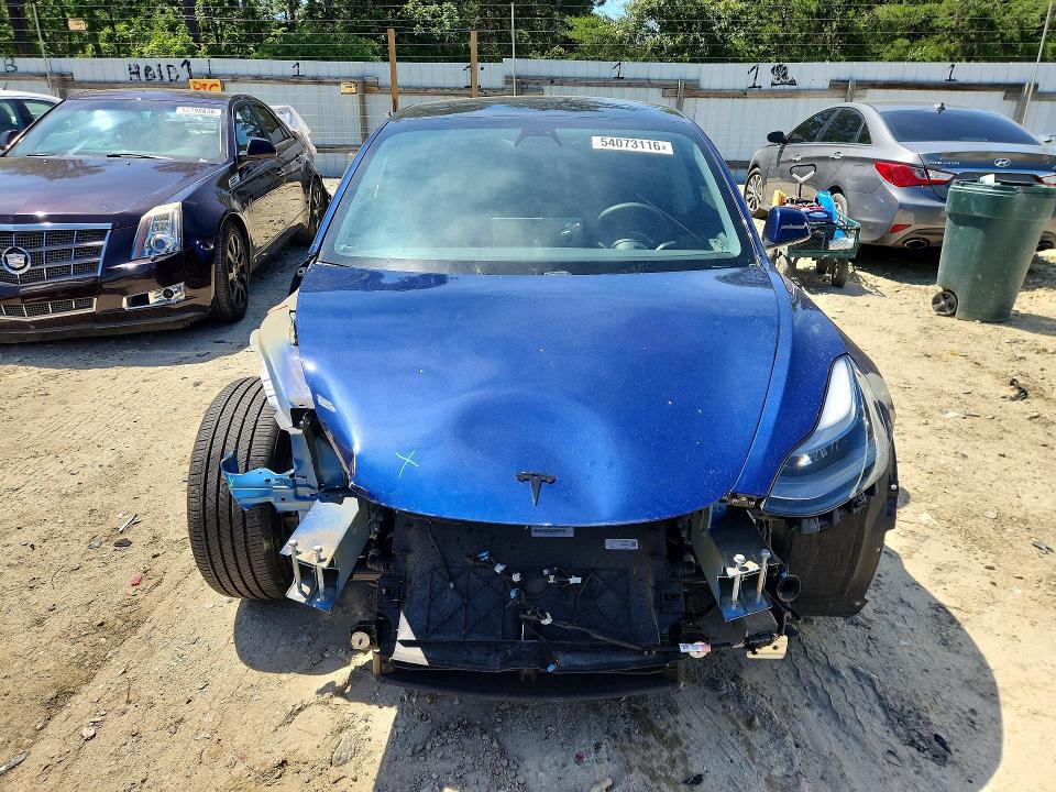 2021 Tesla Model 3 VIN 5YJ3E1EA7MF030481 COPART salvage auction — FRONT END, Md - Cert Of Salvage > 75% Damage, sold $5,000 on 2026-07-28 (photo 5)