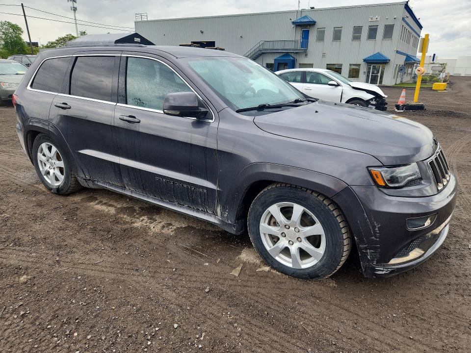 2015 Jeep VIN 1C4RJFCM0FC203404 COPART salvage auction — SIDE, Qc - Gravement Accidente, sold $575 on 2026-07-28 (photo 4)