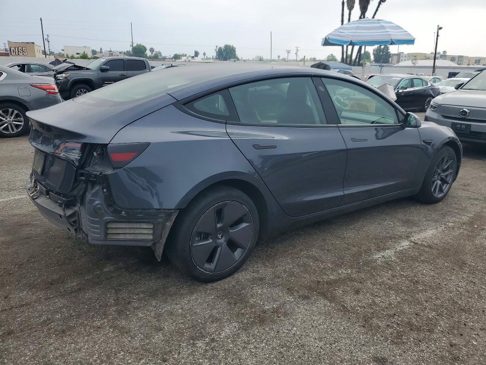 2023 Tesla Model 3 VIN 5YJ3E1EAXPF429115 COPART salvage auction — SIDE, ID - SALVAGE CERTIFICATE OF TITLE, sold $6,700 on 2026-07-31 (photo 3)